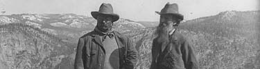 Two great outdoorsmen, TR and John Muir, pose at Yosemite National Park.